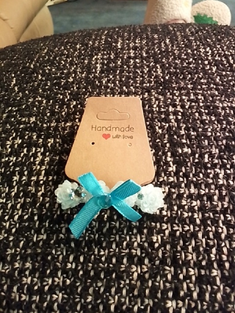Hand Crafted turquoise bow hair clip with white floral accents
